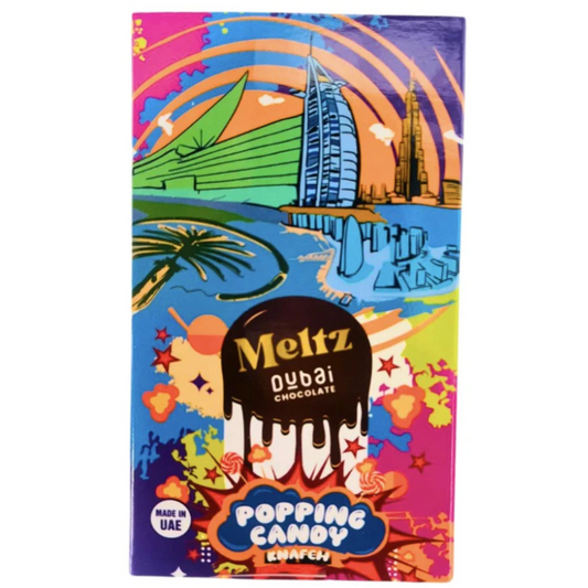 MELTZ - Dubai Chocolate Tropical Candy 75g - Sachet coloré aux motifs tropicaux avec logo MELTZ, contenant des bonbons au chocolat de Dubaï aux saveurs exotiques